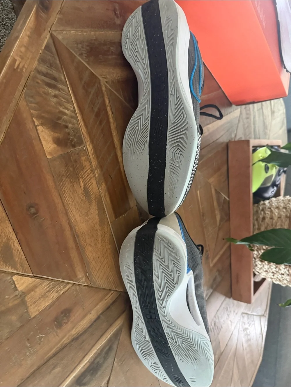 Nike Men’s Gray Athletic Shoes with Blue Swoosh
